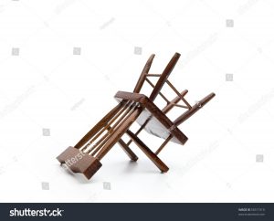 upside down chair stock photo a chair upside down isolated on white